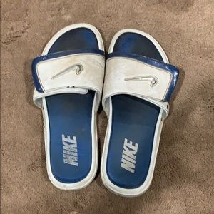 Blue Nike slides